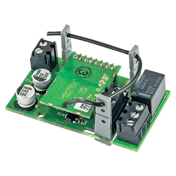 Homematic IP Schaltcontroller HmIP-PCBS - 2,8 x 4,8 x 2,1 cm, Schaltspannung max.: 30 V - Ein grünes Computermodul mit verschiedenen elektronischen Bauteilen, darunter Widerstände und Relais.
