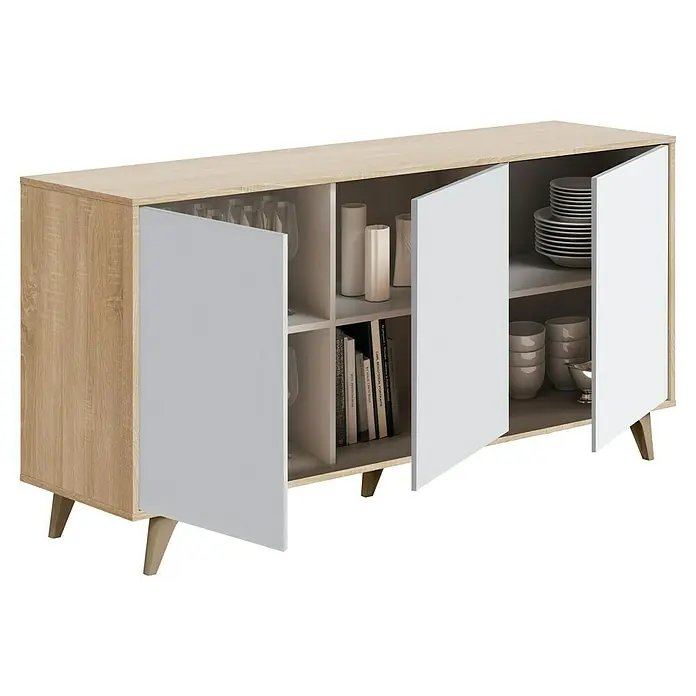 Aparador Kikua Plus - L x An x Al: 40 x 154 x 75 cm, Roble Canadian/Blanco Artik, Número de puertas: 3 ud. - Aparador de madera clara y blanco con puertas abiertas que muestran estantes interiores con vasos, platos y libros.