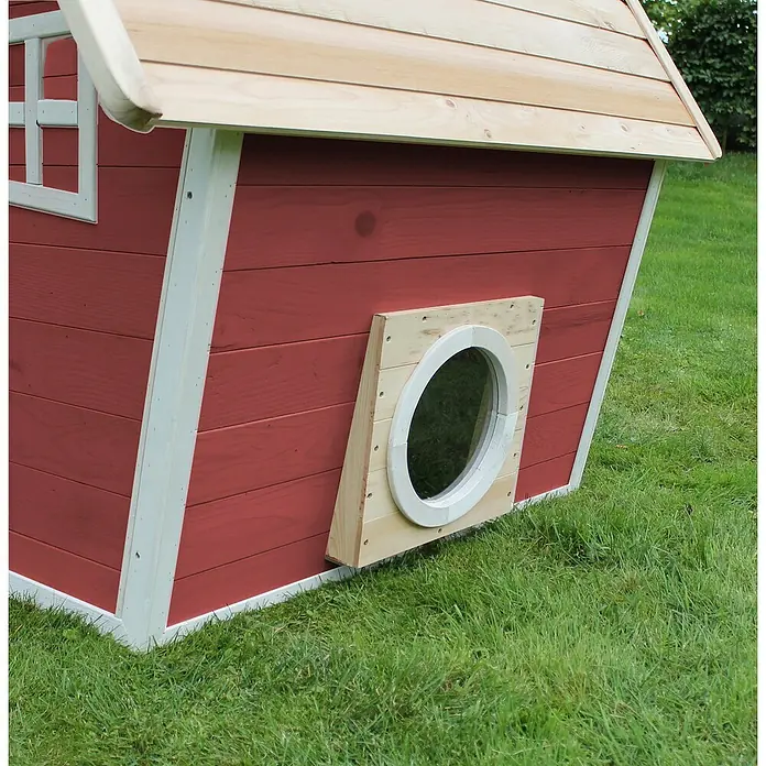 Exit Toys Spielhaus Fantasia 100 - L x B x H: 128 x 108 x 171 cm, Holz, Rot - Rotes Hundehaus aus Holz mit Naturholz-Schindeldach, weißem Zierleisten und Rundfenster.