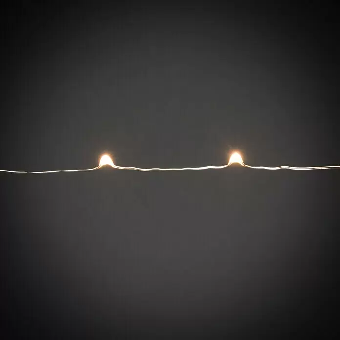 Konstsmide LED-Lichterkette Baummantel - Innen, Lichtfarbe: Bernstein, Anzahl Leuchtmittel: 180 Stk., Netzbetrieben - Leuchtende warmweiße LED Lichterkette.