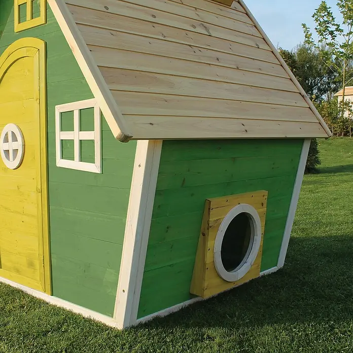 Exit Toys Spielhaus Fantasia 100 - L x B x H: 128 x 108 x 171 cm, Holz, Grün - Farbenfrohes Holzspielhaus in Grün und Gelb mit Naturholzdach, Fenstern und runder Öffnung, im Freien.