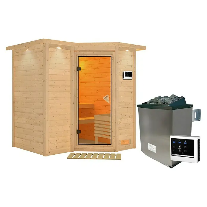 Karibu Massivholzsauna Sahib 1 - Mit 9 kW Ofen mit externer Steuerung, Mit Dachkranz und Beleuchtung, L x B x H: 221 x 198 x 200 cm - Eine helle Holz-Ecksaunakabine mit Glastür und externem Bedienfeld, dazu ein separater silberner Saunaofen mit Steinen und eigener Steuerung.