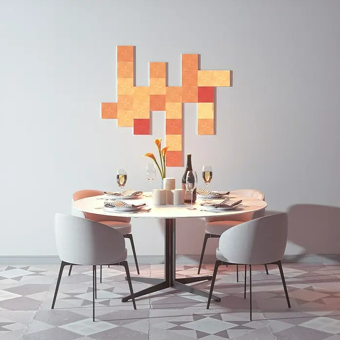 Nanoleaf Erweiterungskit Canvas 4 Panels - 4 Stk., 4 W, Weiß, RGBW, Canvas, Smart Home-fähig: Ja - Ein Esstisch mit vier Stühlen, dekoriert mit Geschirr, Gläsern und Blumen, beleuchtet von einer modernen Wandleuchte.
