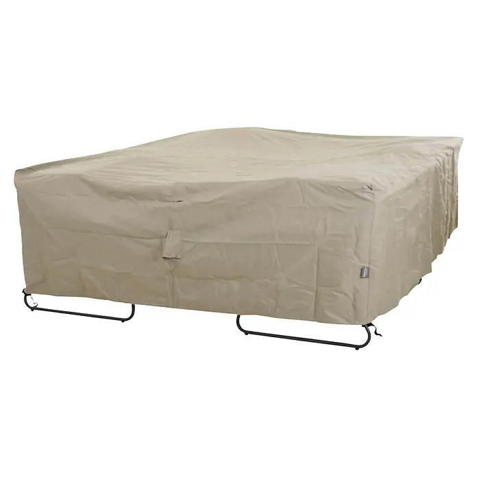 Siena Garden Loungemöbel Schutzhülle PLUS - L x B x H: 270 x 210 x 70 cm, Polyester, TPU laminiert, Beige - Beige rechteckige Outdoor-Möbelabdeckung aus Stoff, über Möbeln mit sichtbaren schwarzen Metallbeinen.