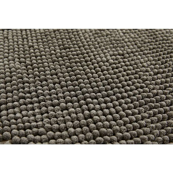Badteppich Zottel - 50 x 80 cm, Anthrazit, 100% Polyester - Nahaufnahme einer grauen, texturierten Badematte mit weicher Noppenoberfläche.