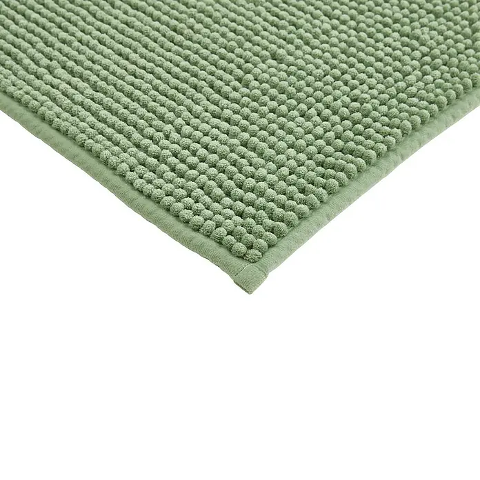 Badteppich Zottel - 50 x 80 cm, Salbei, 100% Polyester - Nahaufnahme einer weichen, grünen Badematte mit ausgeprägtem Noppendesign und Paspelrand.