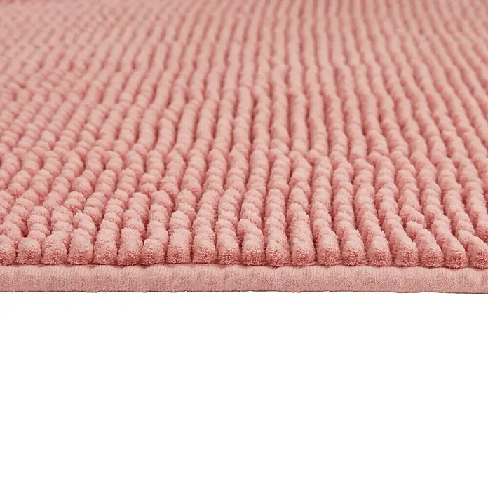 Badteppich Zottel - 50 x 80 cm, Rose, 100% Polyester - Nahaufnahme einer weichen, strukturierten Badematte aus rosa Mikrofaser.