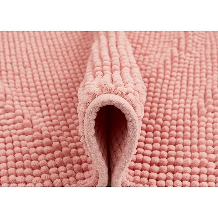Badteppich Zottel - 50 x 80 cm, Rose, 100% Polyester - Rosa Plüschmatte mit Noppenstruktur, gefaltet, um den weichen, tiefen Flor zu zeigen.