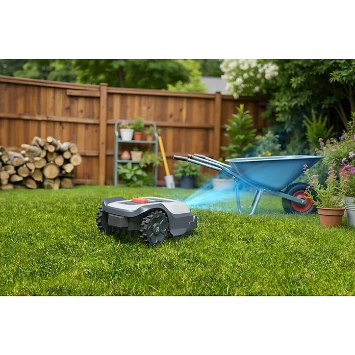 RoboUp Mähroboter T600 - 800 m², Schnittbreite: 20 cm, Kamera-gestützte Navigation, RTK - Grau-schwarzer Rasenroboter mit orangefarbenem Knopf mäht aktiv grünes Gras im Garten.