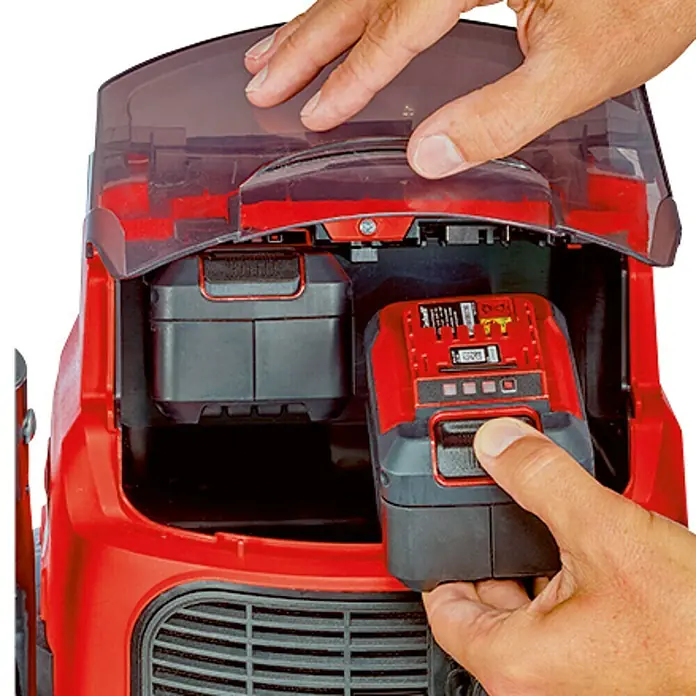 Einhell PXC 18V Aspirador en seco y húmedo de batería TE-VC 36/30 Li S-Solo - 18 V, Sin batería, Volumen de recipiente: 30 l - Batería insertada en una aspiradora roja, que presenta una tapa transparente.