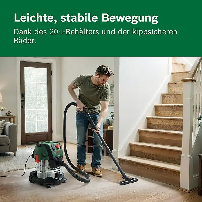 Bosch Elektro-Nass- & Trockensauger PAS 20-220P - 1.350 W, Behältervolumen: 20 l - Mann saugt mit grünem und transparentem Bosch Nass-/Trockensauger mit 20L Behälter und stabilen Rädern für leichte Bewegung.