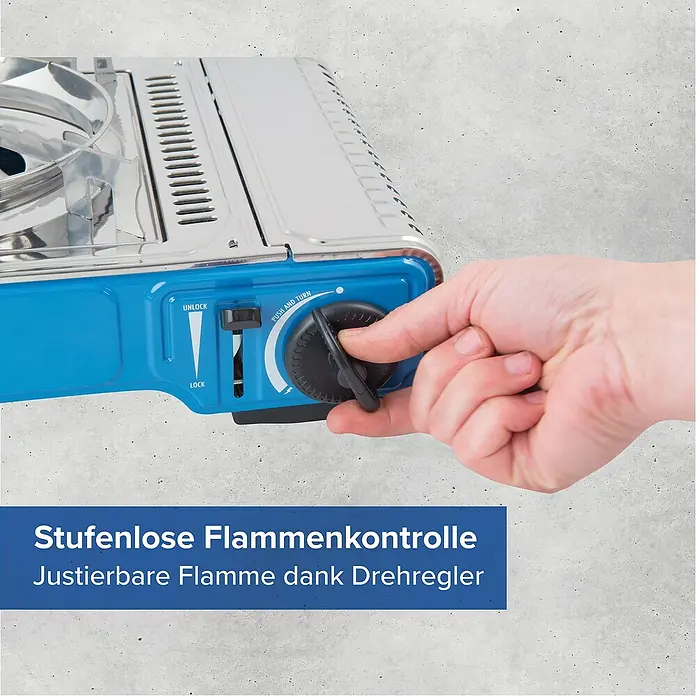 Campingaz Gaskocher Camp Bistro DLX - L x B x H: 285 x 370 x 125 mm, Leistung: 2.120 W, Ohne Stopgaz-System - Hand verstellt den schwarzen Drehknopf eines blau-silbernen Gaskochers zur stufenlosen Flammenkontrolle.
