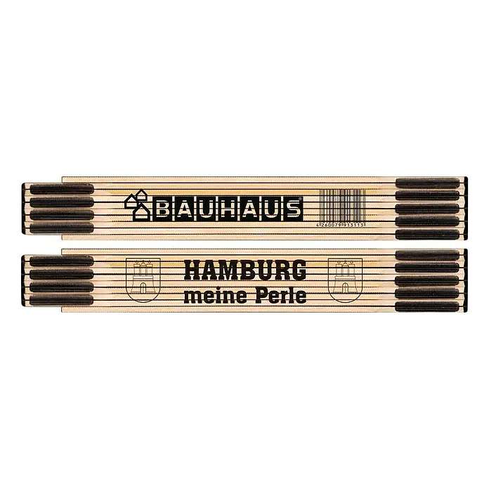 BAUHAUS Zollstock - Hamburg - Meine Perle, 2 m - Messstab mit Bauhaus- und Hamburg-Motiv. Der Messstab ist aus Holz und zeigt Logos und den Schriftzug "meine Perle".