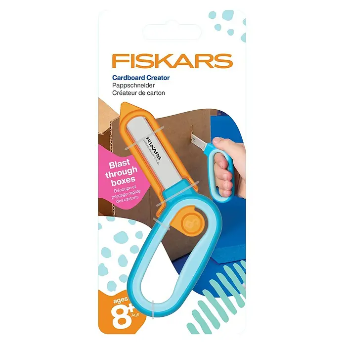 Fiskars Bastel-Set Kreativset für Kinder aus Pappe - 2 -tlg. - Blau-oranges Fiskars Pappschneider-Werkzeug schneidet einen Karton.