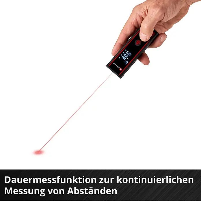 Einhell Laserentfernungsmesser TC-LD 40 R - Messbereich: 0,05 - 40 m, Ohne Batterien - Hand hält schwarzen und roten Laser-Entfernungsmesser, der einen roten Laserstrahl aussendet und Messungen anzeigt.