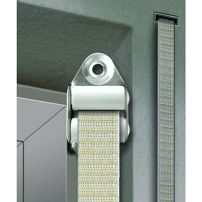 Schellenberg Polea 51002 - Blanco, Anchura de la correa: 23 mm - Primer plano de un riel guía para persianas enrollables con un mecanismo de rodamiento y una banda textil.
