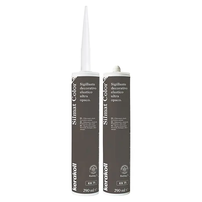 Kerakoll Sellador de resina - Silmat Color - Color: KK 71, 290 ml - Dos tubos gris oscuro de sellador decorativo elástico ultra mate Kerakoll Silmat Color, 290 ml cada uno, con tapas y texto blancos.