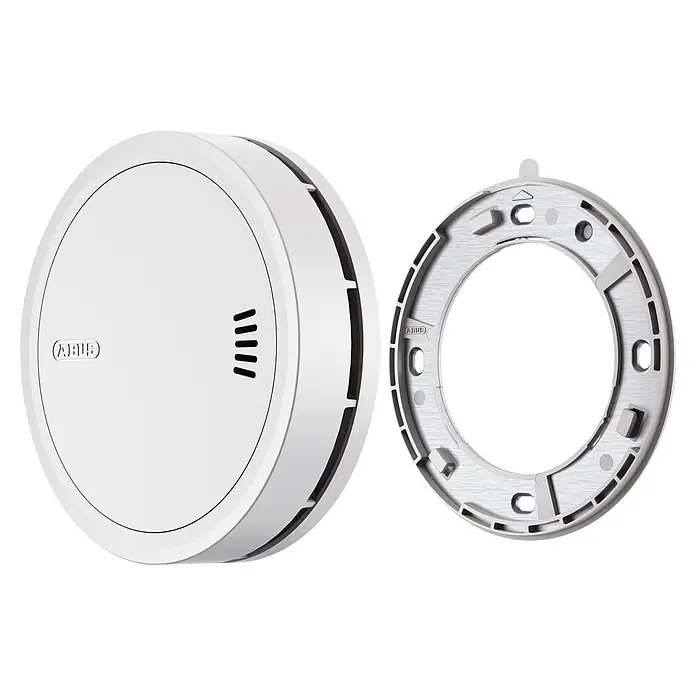 Abus Rauchwarnmelder PREFIRA CONNECT - Batterielaufzeit: 10 Jahre, Alarmsignal: 85 dB, 1 Stk. - Weißer ABUS Rauchmelder und seine Montageplatte.