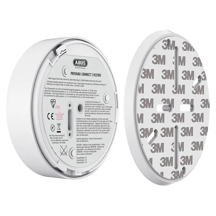 Abus Hitzewarnmelder PREVARO CONNECT - Batterielaufzeit: 10 Jahre, Alarmsignal: 85 dB, 1 Stk. - Weißer ABUS Hitzemelder von hinten mit Produktetiketten und 3M Klebepad zur Montage.