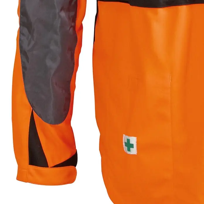 Oregon Chaqueta de trabajo Yukon - XXXL, Naranja/Gris - Primer plano de una chaqueta de seguridad naranja y gris oscuro con un símbolo de cruz verde de primeros auxilios.