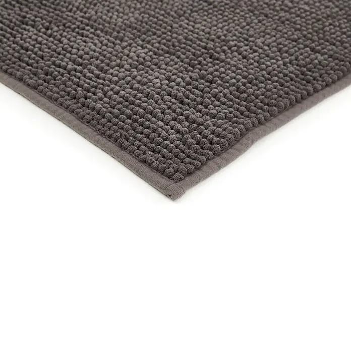 Badteppich Zottel - 50 x 80 cm, Anthrazit, 100% Polyester - Nahaufnahme einer dunkelgrauen Badematte mit weicher, getufteter Noppenstruktur und sauber genähtem Rand.