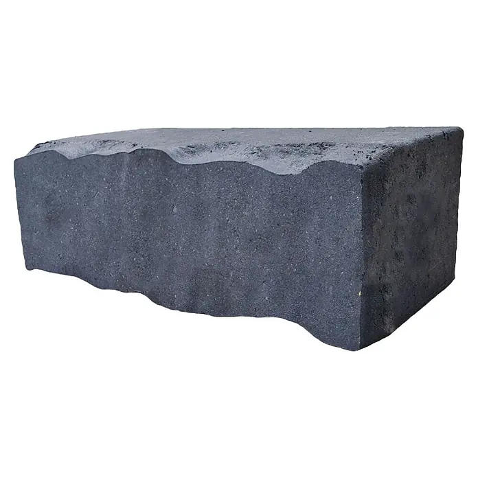 Diephaus Mauersteinmuster Victorville - Basalt - Dunkelgrauer Betonstein mit wellenförmigen Kanten, ideal für Gartenbegrenzungen.