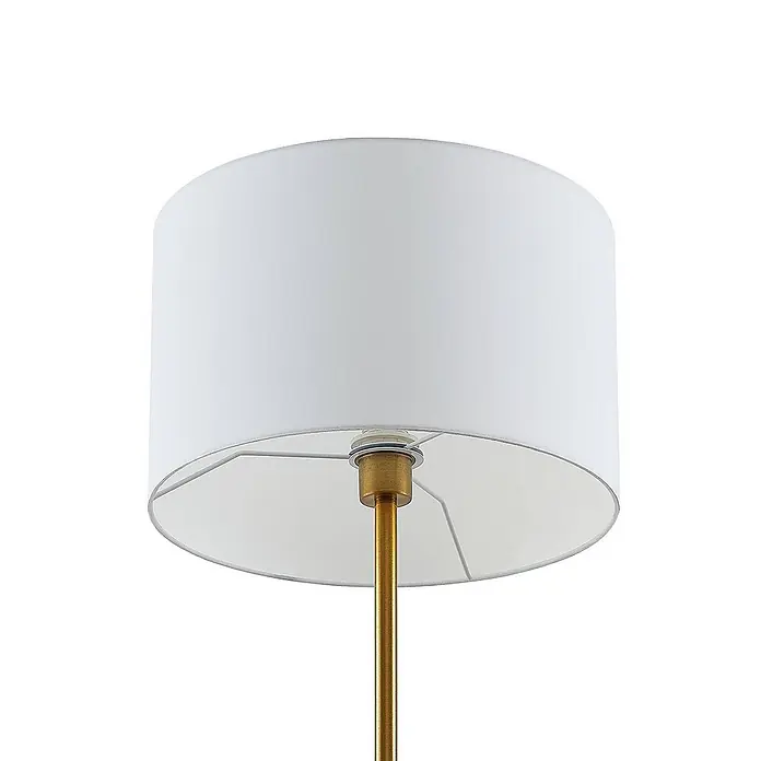 Lindby Stehleuchte Aovan - Höhe: 170 cm, bronze / altmessing, creme / amber, E27 - Weißer zylindrischer Lampenschirm aus Stoff mit goldenem Metallgestell und Stange.