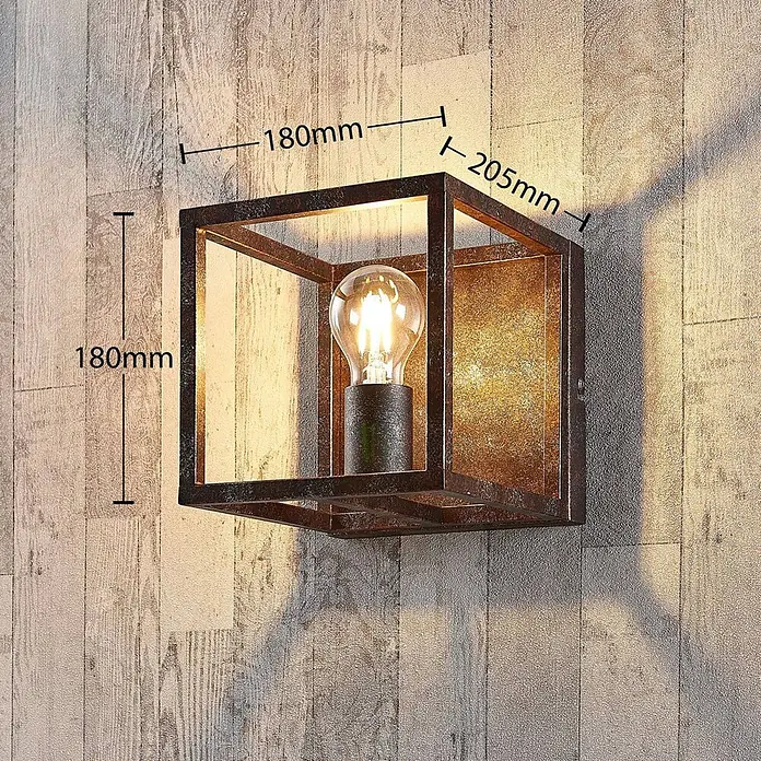 Lindby Wandleuchte Emin - braun / rost, braun / rost, E27 - Industrielle Wandleuchte, 180x180x205mm, mit rostbraunem Metallrahmen und sichtbarer Glühbirne.