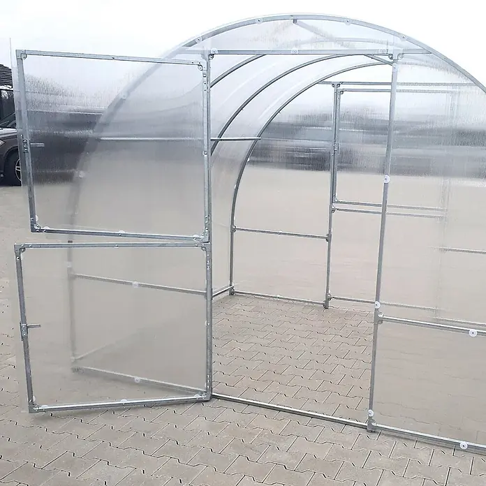 Klasika Greenhouses Gewächshaus Easy Klasika - Außenmaß inkl. Dachüberstand (B x T): 300 x 200 cm, Material Seitenwand: Kunststoff, 4 mm, Silbergrau - Montierter Gewächshausrahmen mit transparenten Wellplatten und geöffneten Türen, auf gepflastertem Untergrund.