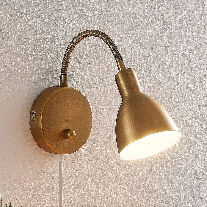 Lindby Wandleuchte Amrei - bronze / altmessing, bronze / altmessing, E14 - Wandleuchte aus Messing mit flexiblem Schwanenhalsarm, konischem Schirm und rundem Sockel mit Schalter.