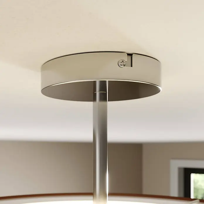 Lindby Deckenleuchte Pikka - braun / rost, E27 - Metallischer zylindrischer Deckenbaldachin mit sichtbarer Schraube, bündig an einer cremefarbenen Decke, mit einer polierten Mittelstange.