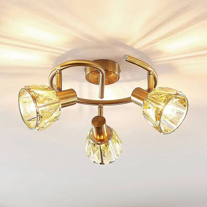 Lindby Deckenleuchte Kosta - messing / gold, E14 - Goldfarbene Deckenleuchte mit drei verstellbaren Kristallstrahlern an rundem Rahmen.