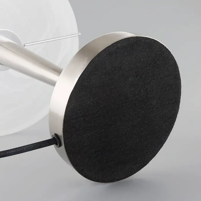 Lindby Tischleuchte Viola - L x B x H: 26 x 26 x 36 cm, alu / grau / zink, weiß / opal, E14 - Unterseite eines Lampensockels mit gebürstetem Metallrand und schwarzer Filzauflage, mit Kabeldurchführung.