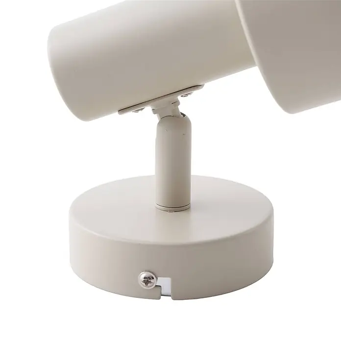 Lindby Wandstrahler Ovelia - creme / amber, creme / amber, E27 - Verstellbare cremefarbene Doppelscheinwerferleuchte auf Rundsockel.
