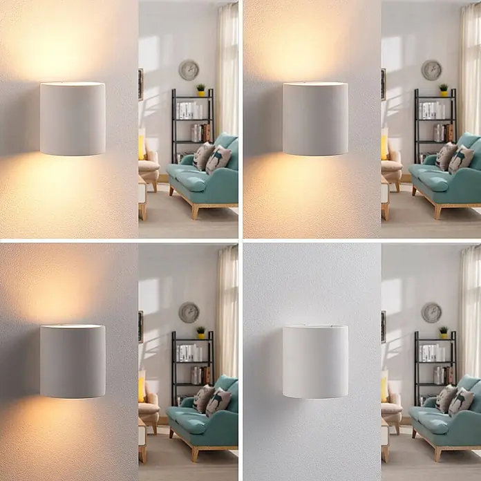 Lindby Wandleuchte Krista - L x B x H: 10 x 10,5 x 10 cm, weiß / opal, G9 - Weiße zylindrische Wandleuchte, montiert an einer Wand, spendet warmes Auf- und Ablicht in einem Wohnzimmerambiente.