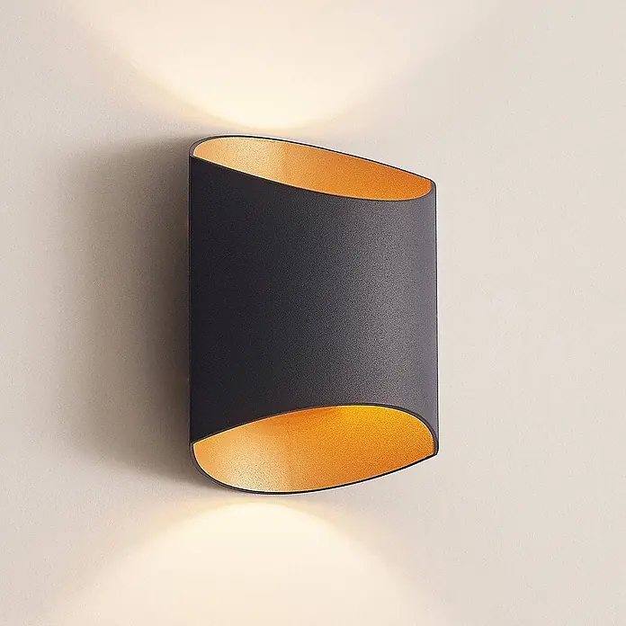 Arcchio Wandleuchte Vilja - schwarz, G9 - Dunkelgraue Wandleuchte mit goldener Innenseite, die indirekte Auf- und Abwärtsbeleuchtung bietet.