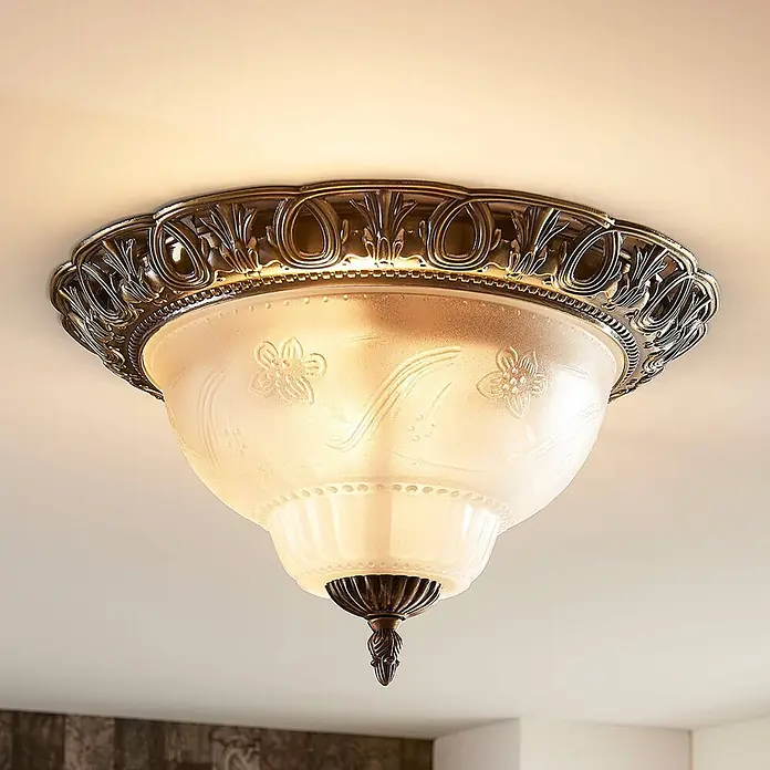 Lindby Deckenleuchte Glas Ø33 cm, Deckenlampe Antik Stil, Glaslampe 2x E14 -  - Verzierte Deckenleuchte aus Bronze mit mattem Glasschirm und geprägten Blumenmustern, an der Decke montiert und beleuchtet.