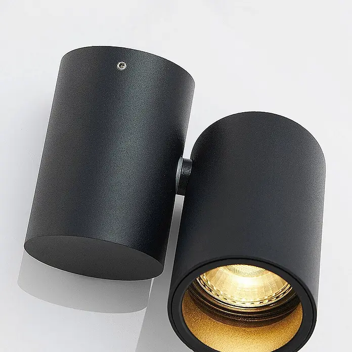 Arcchio Deckenstrahler Gesina - schwarz, schwarz, GU10 - Schwarzer verstellbarer Doppelstrahler aus mattem Metall mit Textur, ein Licht leuchtet.