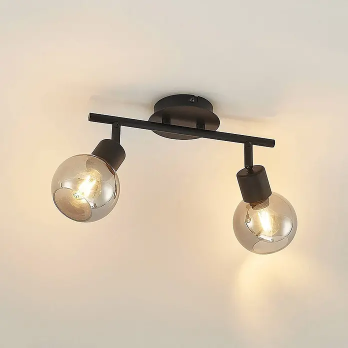 Lindby Deckenstrahler Eridia - schwarz, schwarz, E14 - Schwarze Metall-Deckenleuchte mit zwei verstellbaren Kugelschirmen aus Rauchglas und sichtbaren Glühbirnen.