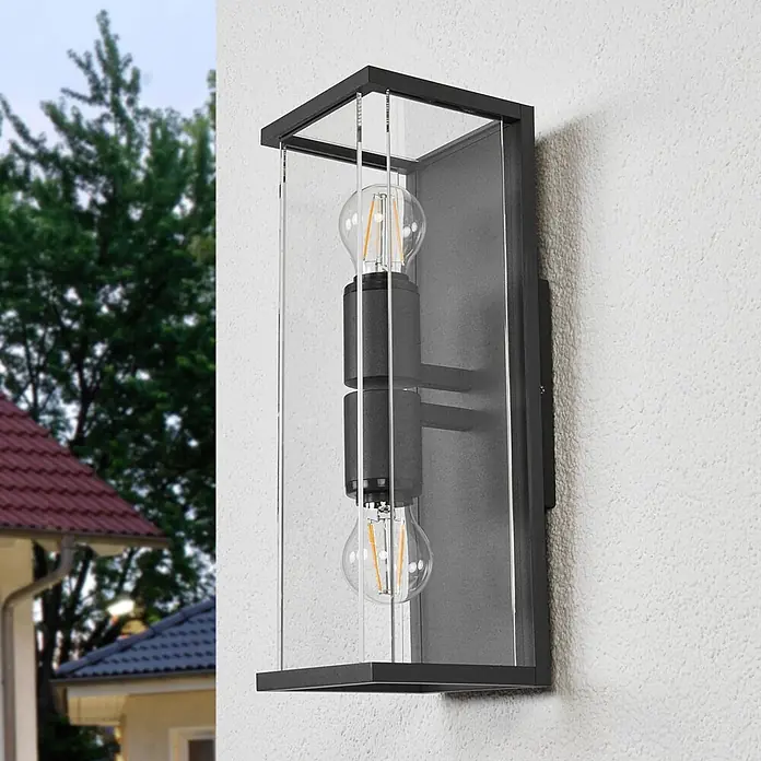 Lucande Außenwandleuchte Annalea - schwarz, klar / transparent, IP54 - Schwarze Außenwandleuchte mit Klarglas und zwei sichtbaren LED-Birnen.