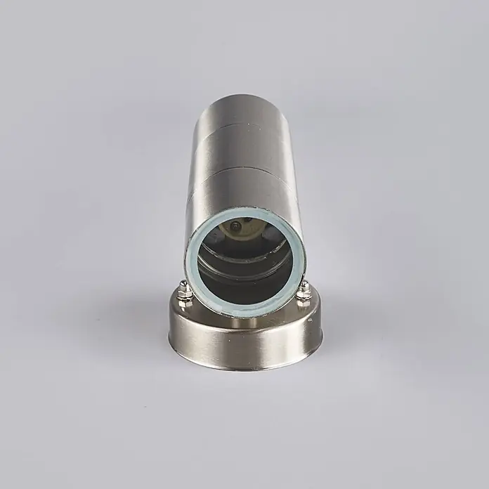 Lindby Außenwandleuchte Hakan - alu / grau / zink, alu / grau / zink, IP44 - Zylindrische Leuchte aus gebürstetem Silbermetall mit rundem Sockel, innen mit Lampenfassung.