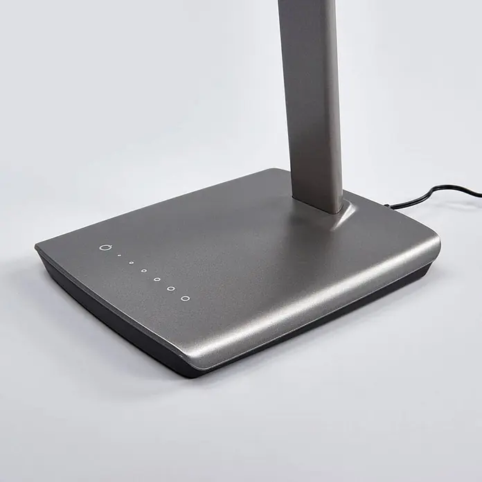 Lindby Tischleuchte Kuno - L x B x H: 37,6 x 15,8 x 46 cm, alu / grau / zink, alu / grau / zink - Grauer Metall-Schreibtischlampensockel mit Touch-Bedienelementen und aufrechtem Arm, Netzkabel sichtbar.