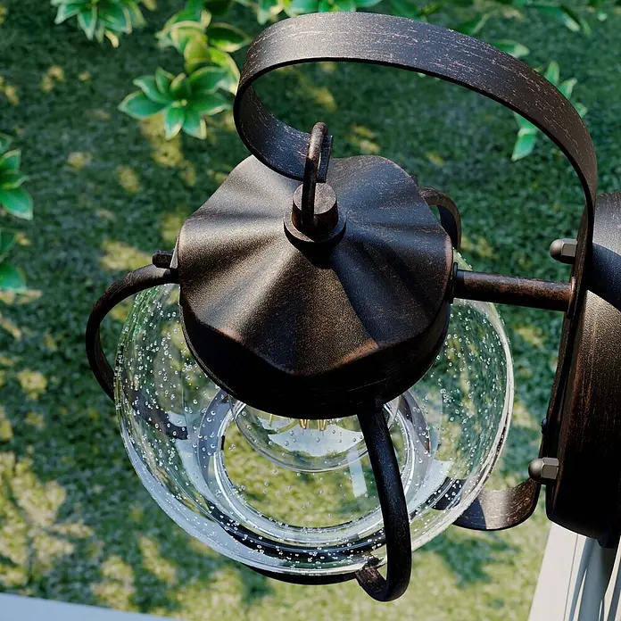 Lindby Außenwandleuchte Gerlo - braun / rost, IP23 - Dunkelbronzene Außenwandleuchte mit strukturierter Oberfläche und blasenversetztem Glaskolben.