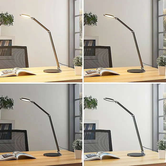 Lucande Tischleuchte Mion - L x B x H: 35 x 18 x 41 cm, alu / grau / zink, alu / grau / zink - Schwarze, verstellbare LED-Schreibtischlampe mit ovalem Leuchtkopf auf hellem Holzschreibtisch.