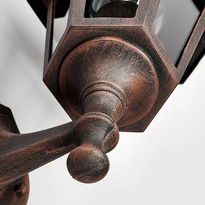 Lindby Außenwandleuchte Lamina - braun / rost, braun / rost, IP44 - Rustikale Außenwandleuchte aus Metall mit Bronze-Finish, sechseckiger Laterne und Zierarm.
