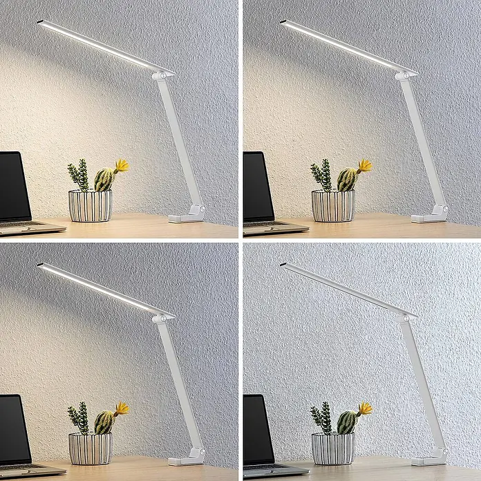 Prios Tischleuchte Tamarin - L x B x H: 40,6 x 9,5 x 40 cm, weiß / opal, weiß / opal - Verstellbare weiße LED-Schreibtischlampe beleuchtet einen Schreibtisch mit Laptop und Pflanze.
