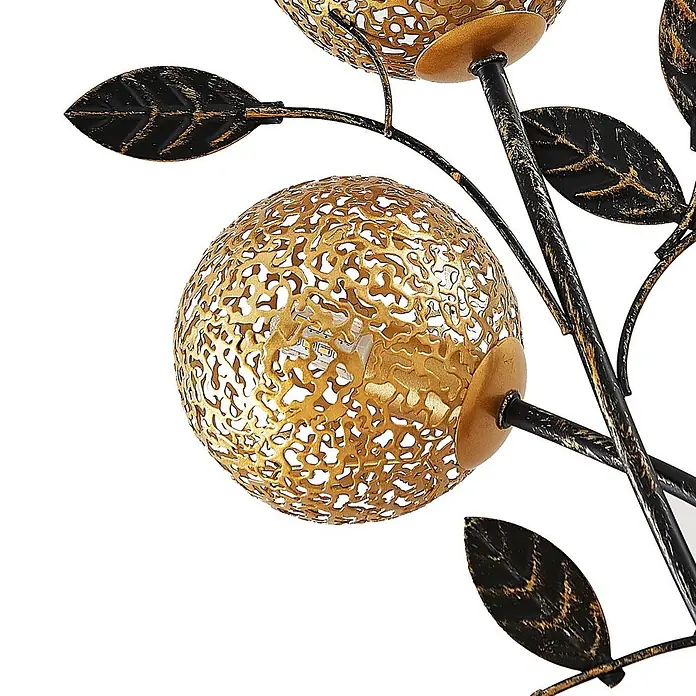 Lucande Tischleuchte Evory - schwarz, messing / gold, G9 - Goldene Kugel-Leuchte mit kunstvollen Aussparungen, akzentuiert durch schwarze und goldene Metallblätter an Ästen.