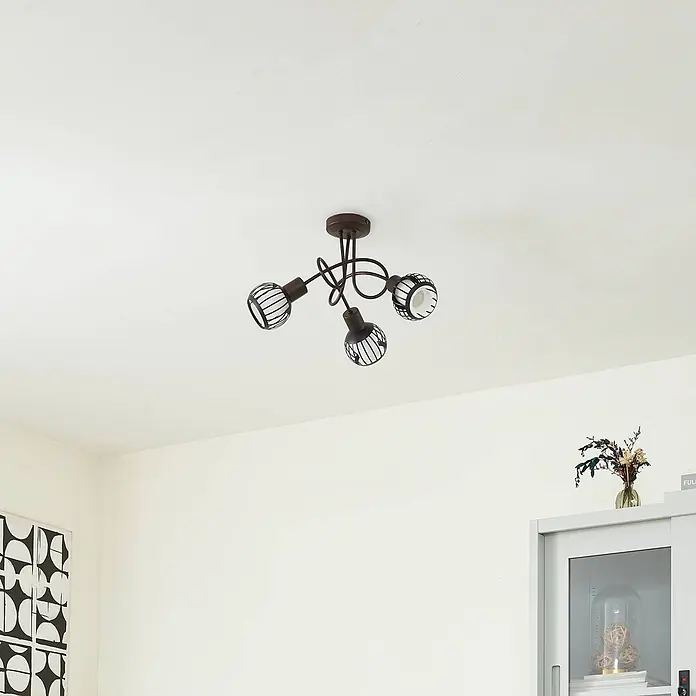 Lindby Deckenleuchte Solm - braun / rost, braun / rost, E14 - Eine dunkelbraune Deckenleuchte aus Metall mit drei verstellbaren Strahlern, jeweils mit einem Käfigdesign.