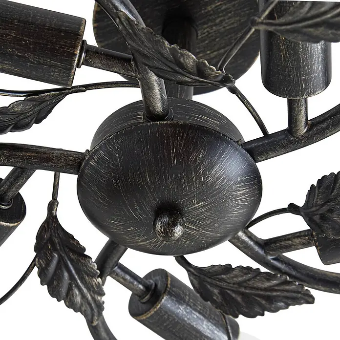 Lindby Deckenleuchte Yos - L x B x H: 58 x 58 x 21 cm, schwarz, E14 - Detail einer verzierten Deckenleuchte aus dunklem Altmessing mit dekorativen Blättern und Fassungen.