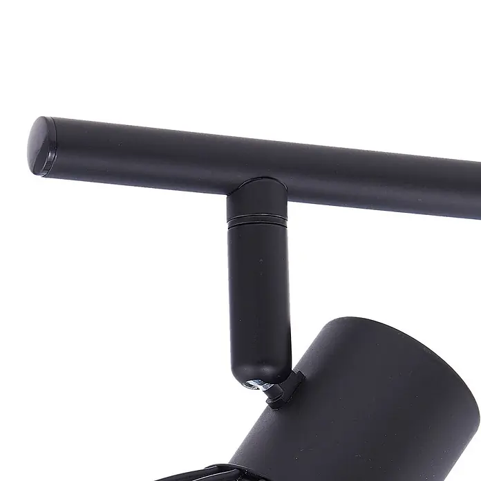 Lindby Deckenleuchte Piena - L x B x H: 150 x 9,3 x 22 cm, schwarz, schwarz, E14 - Nahaufnahme eines mattschwarzen Stromschienenstrahlers, an einer horizontalen Schiene befestigt, mit verstellbarem Kopf.